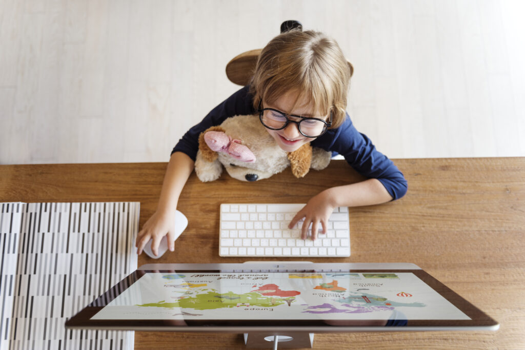 Little Girl Using Computer Concept